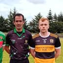Carndonagh captain Danny Monagle, referee Kevin McGinley and Naomh Ultan captain Daniel Gallagher