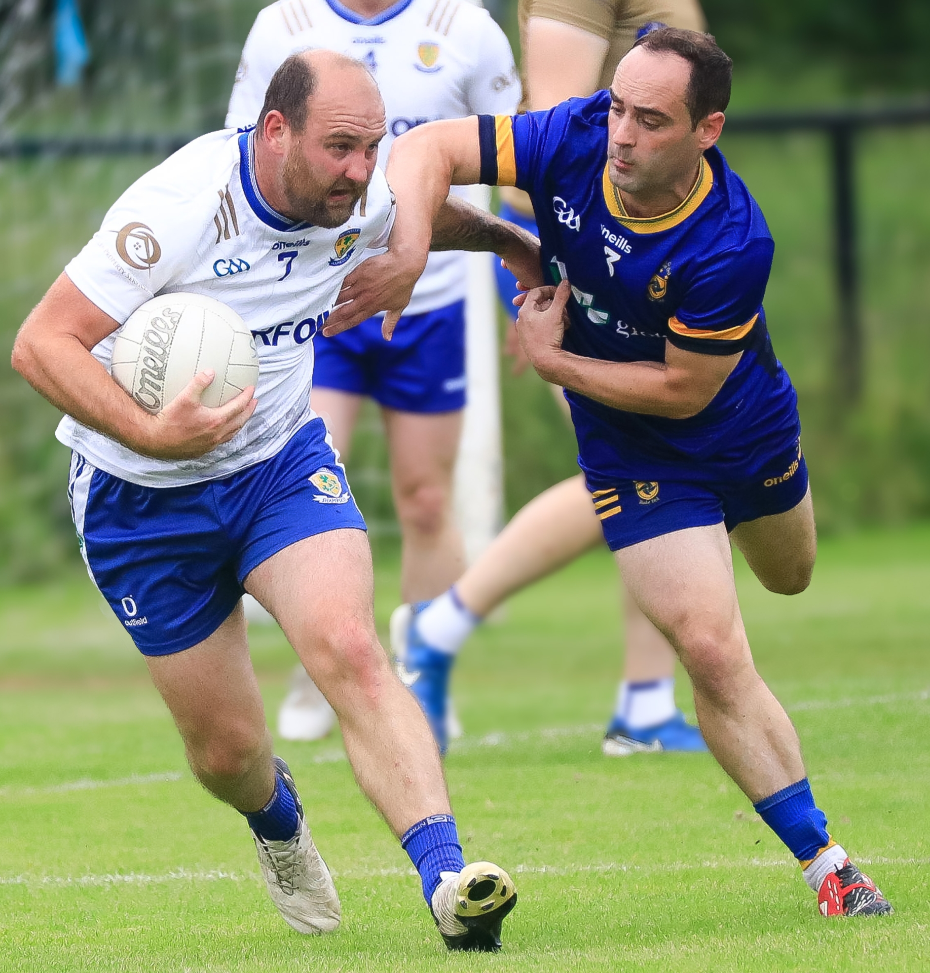 Ballinderry Darren Lawn tackled by Steelstown Brian Ogs Gareth Logue.  (Photo - Tom Heaney, nwpresspics)