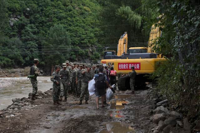 Premier Li Qiang said the heavy rain and flooding in the hard-hit Beijing district of Miyun caused “serious casualties” and called for rescue efforts, according to the Xinhua News Agency.