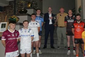 Senior "B" football captains with Offaly GAA chairman Tom Parlon and the sponsors