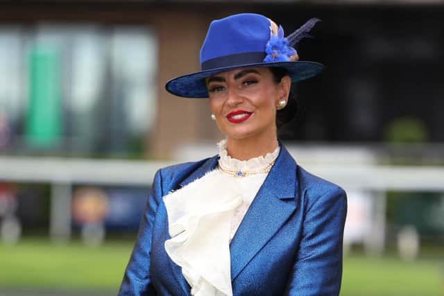 She accompanied the suit with shoes from Dune, a hat by Alison Roe Roscrea.