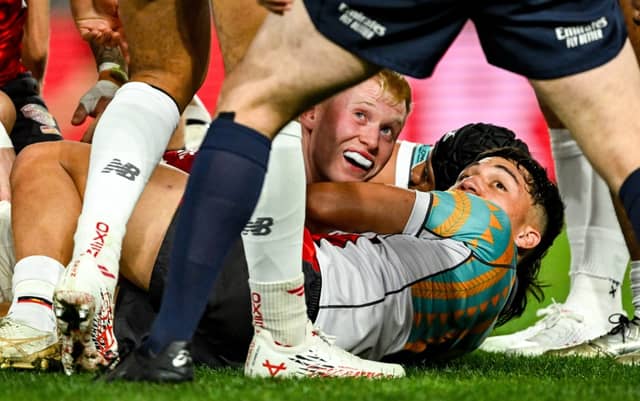 Jamie Osborne checks with the referee upon scoring his side's first try during the tour match between First Nations & Pasifika XV and the British & Irish Lions Marvel Stadium, Photo by Sportsfile