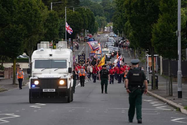On Sunday morning, an Orange Order parade has been permitted to pass Ardoyne shops in north Belfast restricted to one band and 50 members of the order.
