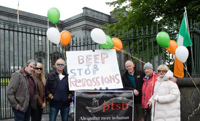 Tom Roche and supporters outside the courthouse in Tullamore