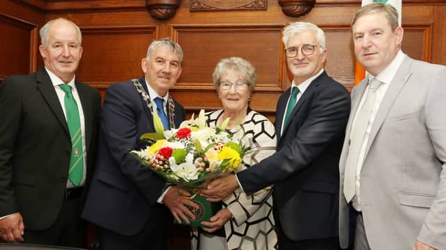 Paul Canning and John McLaughlin of Donegal County Council make a presentation to Margaret Blaney with Cllr Liam Blaney and Senator Niall Blaney. Photo: Thomas Gallagher