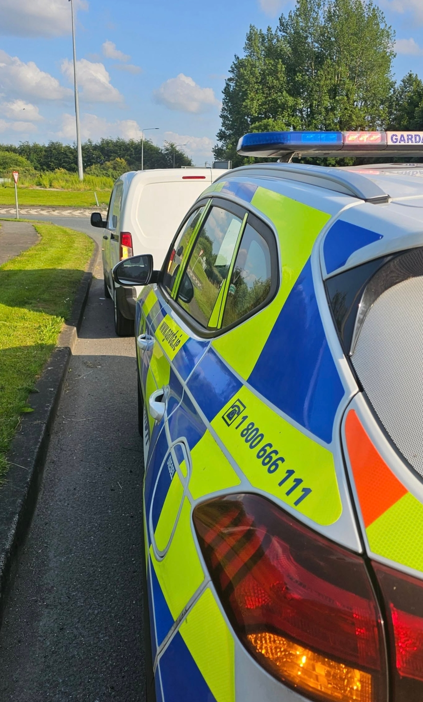 Louth driver so distracted by phone they miss marked Garda car
