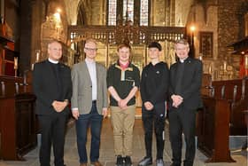 Eóin Moore, 18,  and Pierce Portley, 15 flanked by, from left to right, Scott Elliot, curate assistant,  Peter Barley, organist, and cathedral  dean Niall Sloane | PICTURE: ADRIAN BUTLER