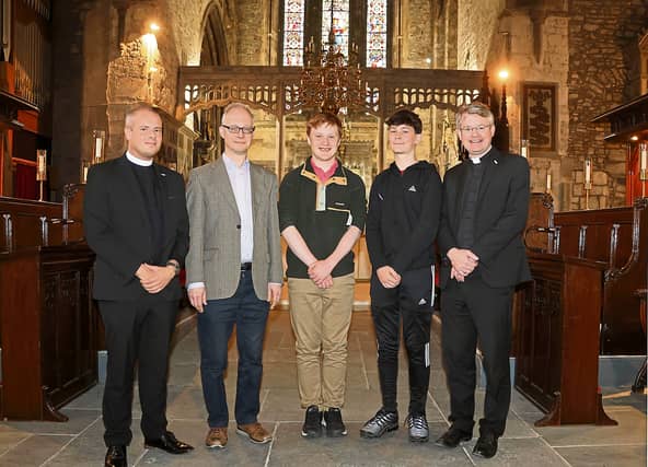 Eóin Moore, 18, and Pierce Portley, 15 flanked by, from left to right, Scott Elliot, curate assistant, Peter Barley, organist, and cathedral dean Niall Sloane | PICTURE: ADRIAN BUTLER