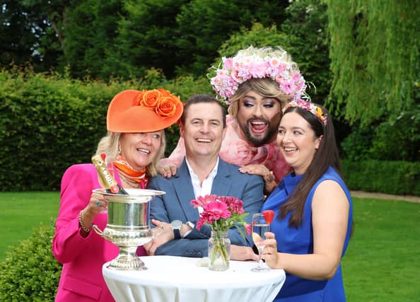 James Patrice, appearing as his iconic character, ‘Malahide Woman’ and former Jockey Fran Berry with Tina Buckley of the Keadeen Hotel (left) with daughter Holly Keogh