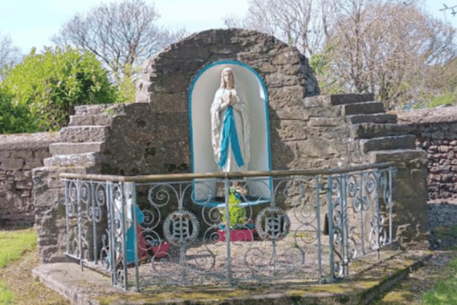 He erected the Shrine to Our Lady of Lourdes, used in the movie 'All things Bright and Beautiful. The Grotto Plaque reads: ‘Shrine to Our Lady, blessed by Sean Canon Collier P.P. 1 st . July, Jubilee Year 2000’.