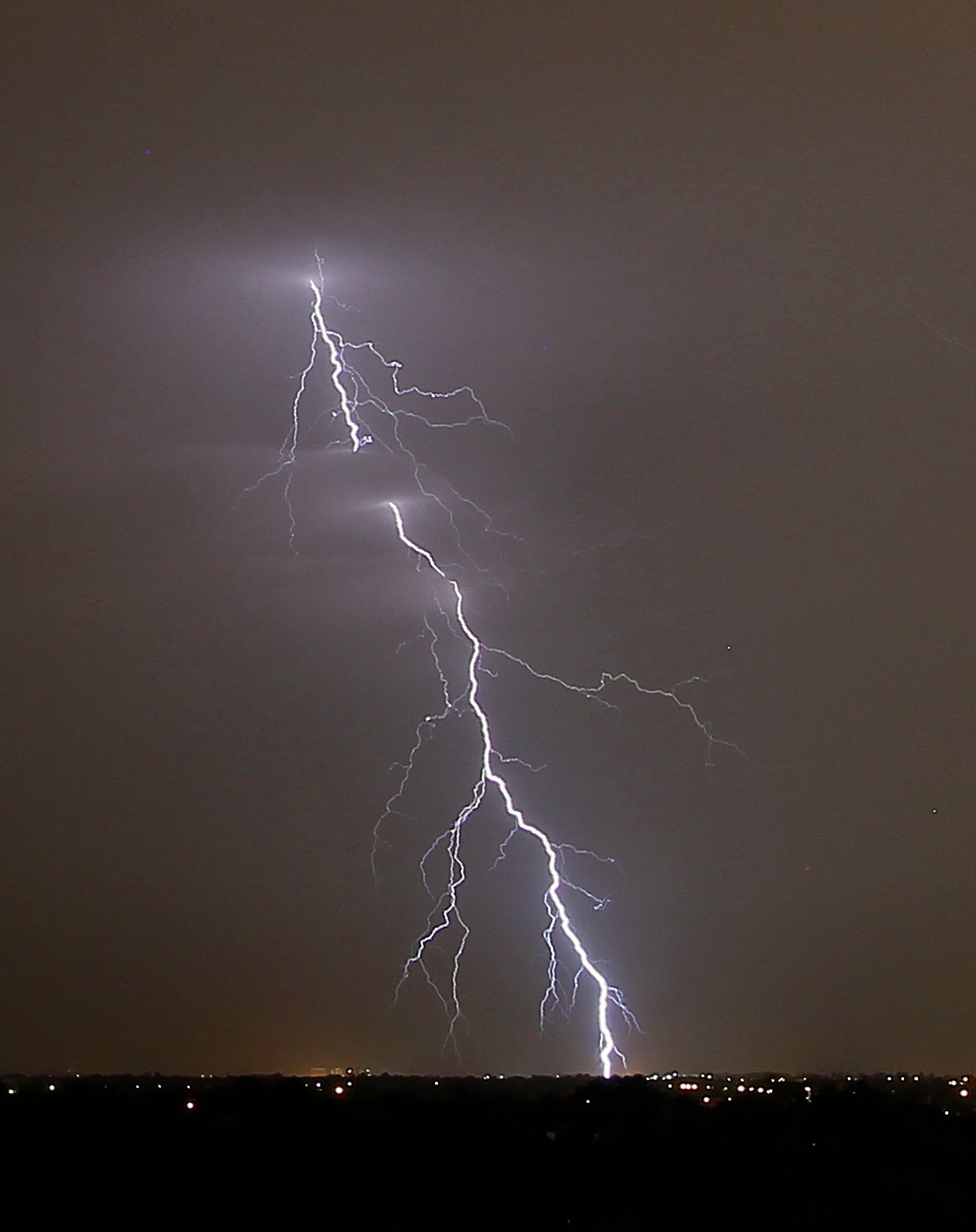 Lightning strike sets house on fire blocking road