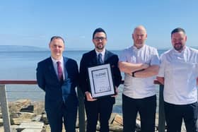Owen McGee, General Manager; Restaurant Manager Keith McGilloway with winning certificate; Executive Head Chef Gordon Smyth, and Head Chef Conor McCormick