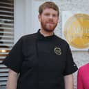 Suzie Lee with chef Phelim O’Hagan outside his restaurant 'Artis' in Derry's Craft Village