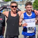Finn Valley AC's Sean McGinley who won the NW 10k with Danny Mooney (2nd) and Declan Ferry (3rd) and NW10k Chairman Neil Martin. Photos: Geraldine Diver