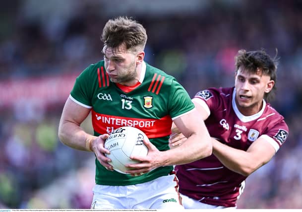 Aidan O'Shea of Mayo in action against Seán Fitzgerald of Galway during the 2024 Connacht GAA Football Senior Championship final between Galway and Mayo at Pearse Stadium in Galway. Pic: Sportsfile