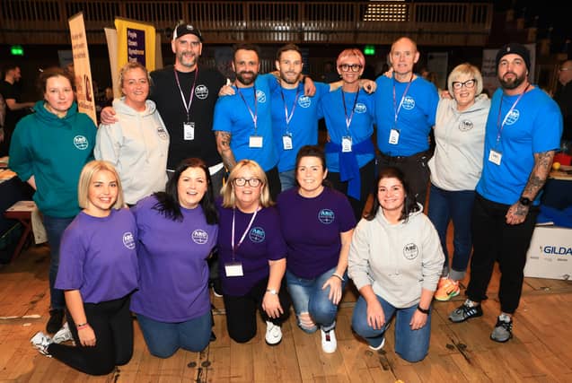 Gary Rutherford, founder/strategic co-ordinator, standing third from left, with his staff and volunteers at last year's Arc Fitness 'Health Fest NW' (Photo - Tom Heaney, nwpresspics)