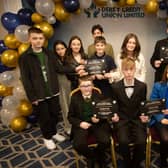 Derry Credit Union's Young People's Awards 2025 nominees being presented with their certificates by Ryan McLaughlin, Youth Committee, on Monday night.