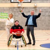 Pictured are head of corporate affairs of the National Lottery Jennifer Crowe, chair of the judging panel, Dáithí Ó Sé and Rebel Wheelers player Jack Quinn | PICTURE: Mac Innes Photography