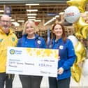 (L-R) Conor O'Kane, Senior Partnership Manager NI at Marie Curie and Tesco Community Champions Sarah-Lee Green and Fionnuala O’Reilly.