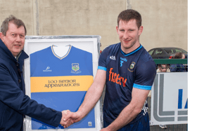 Martin O'Dwyer, Chairman of the Friends of Tipperary Football, makes a presentation to Jimmy Feehan to mark his 100th appearance for the Tipperary senior footballers. Picture: Michael Boland