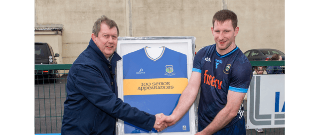 Martin O'Dwyer, Chairman of the Friends of Tipperary Football, makes a presentation to Jimmy Feehan to mark his 100th appearance for the Tipperary senior footballers. Picture: Michael Boland