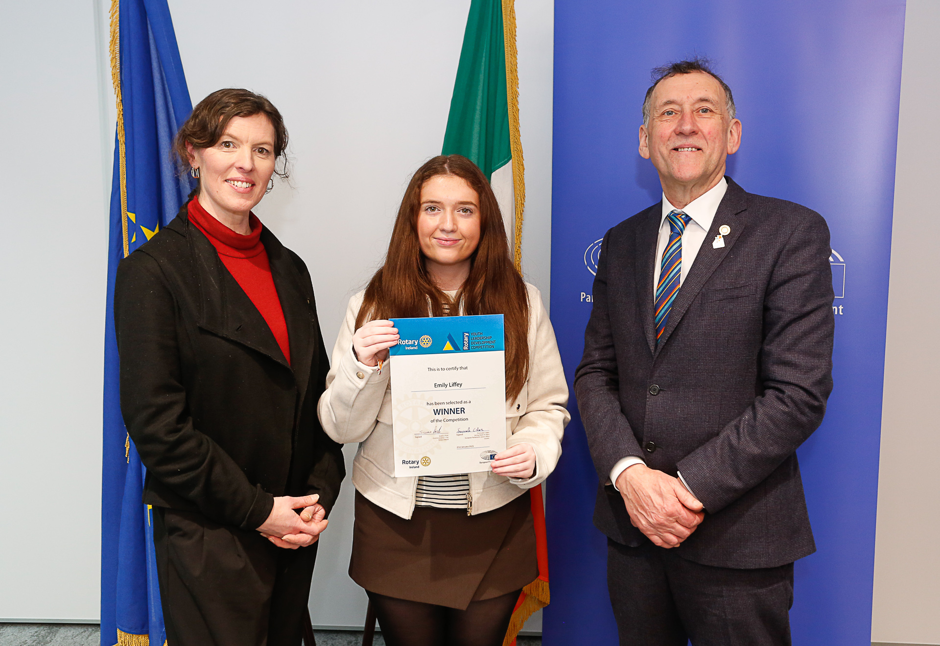 Emily Liffey receiving her Rotary Youth Leadership award from Fionnuala Croker, the European Parliament Office and Seamus Parle, District Governor of Rotary Ireland. Pic: Stephen McCracken Photography