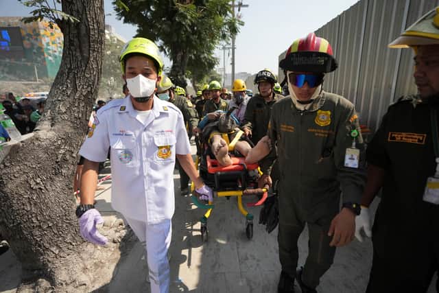One construction worker was killed when rubble from the collapsing building site hit his truck and another was crushed by the falling debris, rescue worker Songwut Wangpon told reporters.