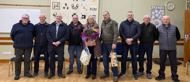 Anne O'Kane, former secretary of the Sperrin Gun Club and Barry Turner, former Chair of the Club both being presented with gifts from SGC members as a mark of appreciation.