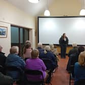 Louise Larkin addressing people before the screening of the fim