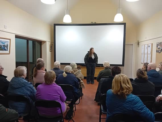Louise Larkin addressing people before the screening of the fim
