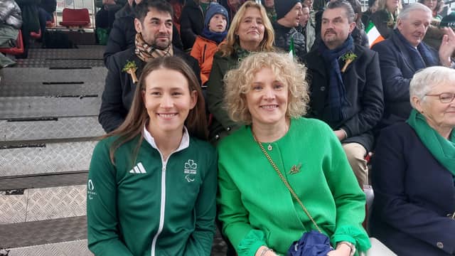 She received a standing ovation from those in the viewing stand as she took her seat with mother Marian Conroy.