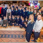 Group Photo pupils with Pennyburn Credit Union manager Frank Doherty and Marketing Executive Laura Brown
