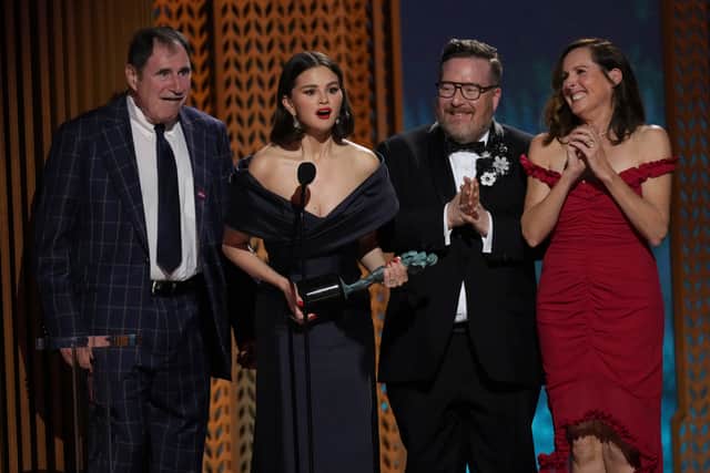 Standing on stage with co-stars Michael Cyril Creighton, Richard Kind, and Molly Shannon, Gomez said: “Wait, we never win, this is so weird.”