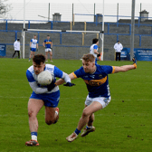 Waterford's Alan Dunwoody tries to break away from Tipperary's Manus McFadden during Sunday's game at Walsh Park. Picture: Michael Boland