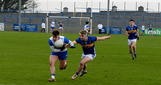 Waterford's Alan Dunwoody tries to break away from Tipperary's Manus McFadden during Sunday's game at Walsh Park. Picture: Michael Boland