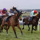 Eternal Echo and Harry Swan on their way to winning for Gordon Elliott at Naas on Saturday. Photo: Patrick McCann/Racing Post
