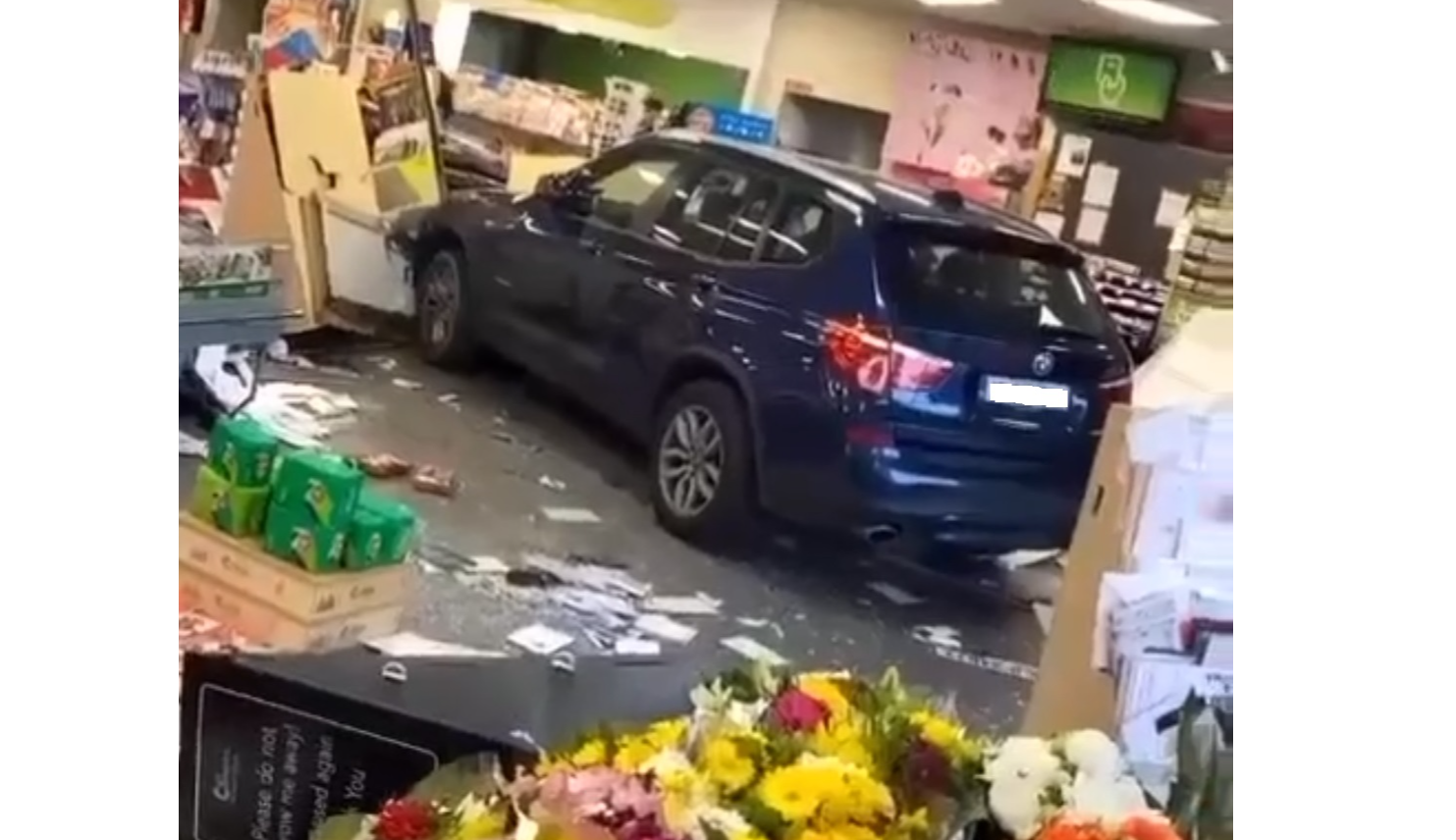 Irish shoppers in shock as car smashes through store front