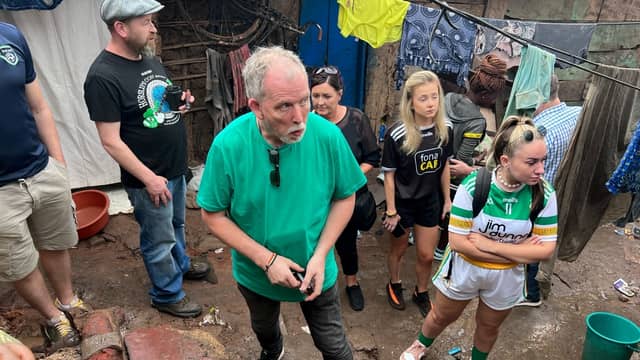 The founder of Hands for Hope School in Kampala, Joe Cummiskey, pictured with some students - the school, which educates children from Manuwongo slum, will benefit from the concert in Buncrana