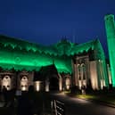 St  Canice's Cathedral lit up in green