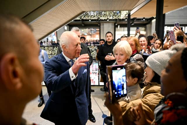 Earlier, the King was shown around the Curated Makers Christmas Market inside Battersea Power Station and met independent retailers.