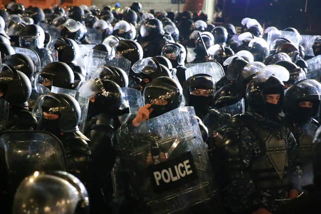 On Wednesday, the Coalition for Change opposition party said that police raided its offices and detained its leader, Nika Gvaramia. It shared a video showing several officers dragging Mr Gvaramia into a car.