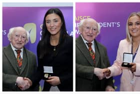 Gillian Fogarty (l) and Claire Henebry (r) receive their awards from President Michael D Higgins