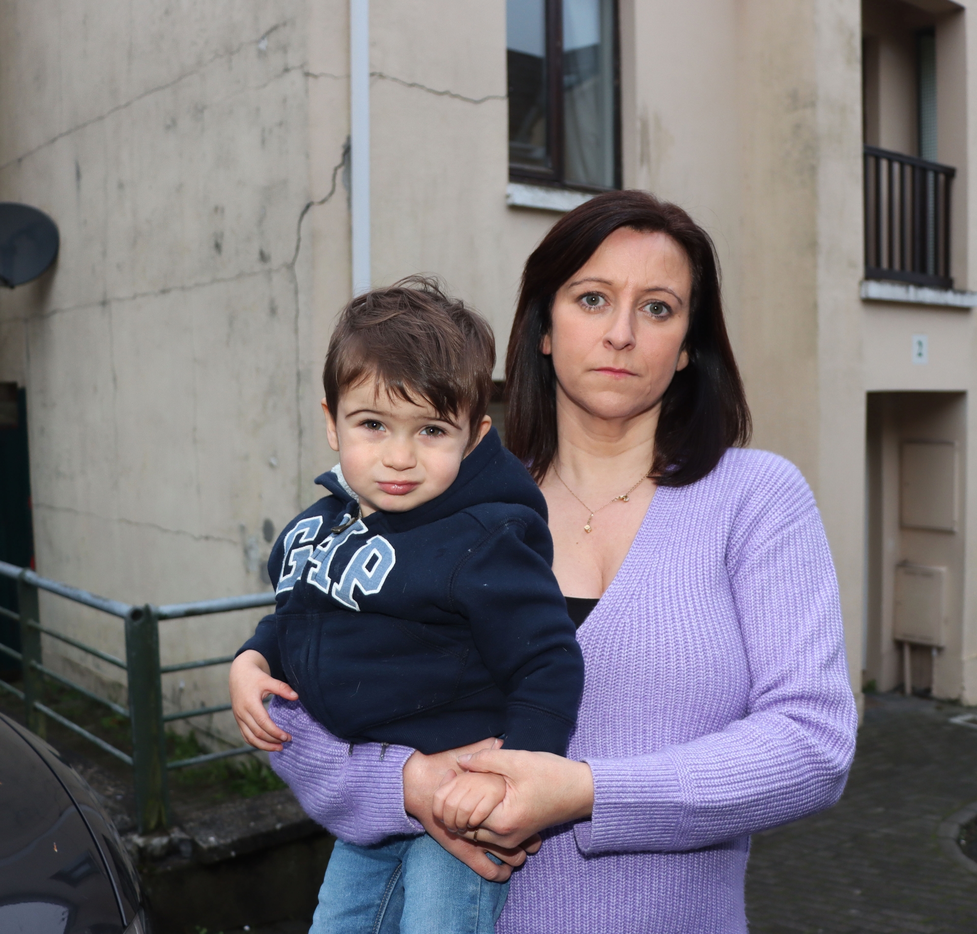 Olivia Shiel and her one-and-a-half year old son Noah outside their pyrite-hit home in the city | PICTURE: Adrian Butler