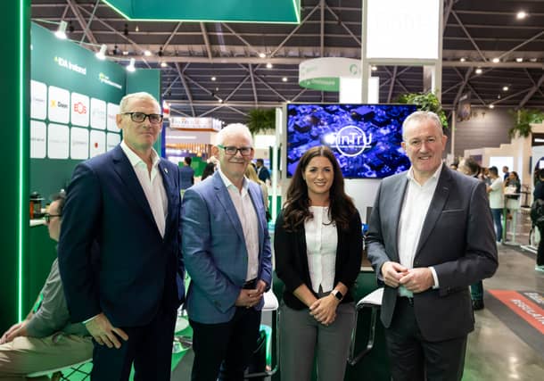 Nick Caldwell, Invest NI Head of Asia Pacific; Karl Hanlon, Chief Commercial Officer, FinTrU; Marie-Therese Kane, Senior Vice President Technology Sales at FinTrU; and Economy Minister Conor Murphy.