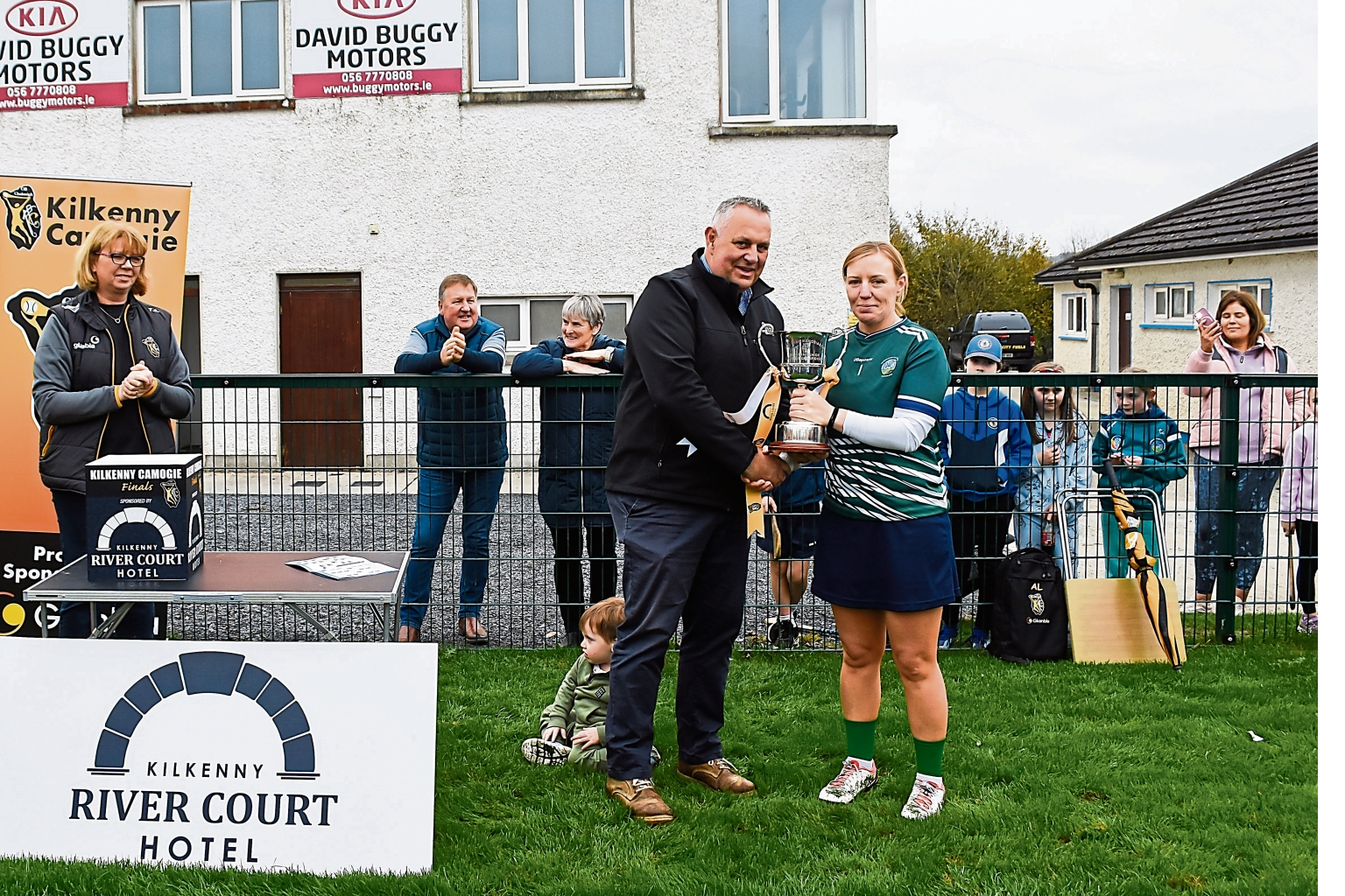Emeralds captain Siobhan O’Hara is presented with the trophy by Anthony Smith, Rivercourt Hotel. Picture: Billy Culleton