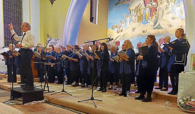 The Cois Nore Choir in St Senan’s Church with conductor Adrian O’Keeffe
