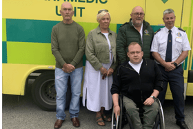 Tom Strappe (standing, second from right) with his brother Joe (left), wife Susan, Ambulance Officer Alan Walsh (right) and son Jamie (front)