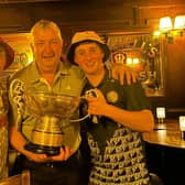 GAA stars fill county cup with unusual drink at Offaly pub they once worked in