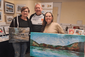 Limerick Boat Club captain Alan Stack with artists Karina Guseva and Edwina Knight