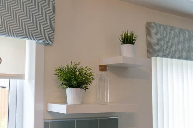 “These shelves can be used to store items not frequently accessed, such as decorative dishes, glassware, or cookbooks.”